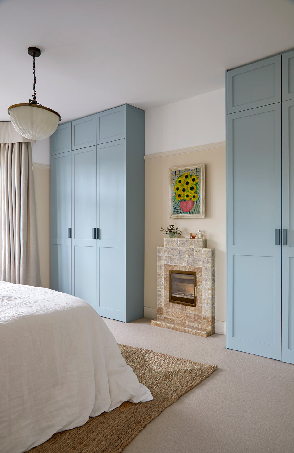 Fitted wardrobes, wardrobes, south east London, bespoke, walk in closet, bedroom storage solutions, made to measure wardrobe, shaker doors, custom made, best joinery London, bespoke wardrobe design, modern joinery, luxury joinery, high end joinery, joinery services, Interior design, bedside table, modern bedroom, bedroom joinery, storage solutions, blue wardrobe, duck egg, triple door wardrobe, flower painting, vintage art, deco fireplace,  wardrobe inspiration.
