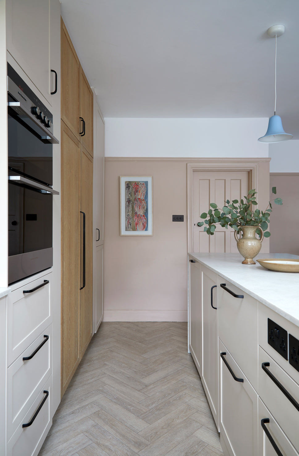 Bespoke Kitchen, Bespoke kitchen design, Bespoke Kitchen south east London, Kitchen design, Minimal kitchen, Minimal kitchen design, Kitchen Island, Kitchen specialist, Shaker kitchen, Shaker style cabinets, Larder, Utility Room, Modern Shaker kitchen, Wine-rack, kitchen ideas, coffee station, kitchen shelving, pendant lights, kitchen stools, french lighting, sleek kitchens, trending kitchens, kitchen trends, minimal living, minimal living kitchens, oak veneer kitchen, mono coat staining, herringbone floor,
